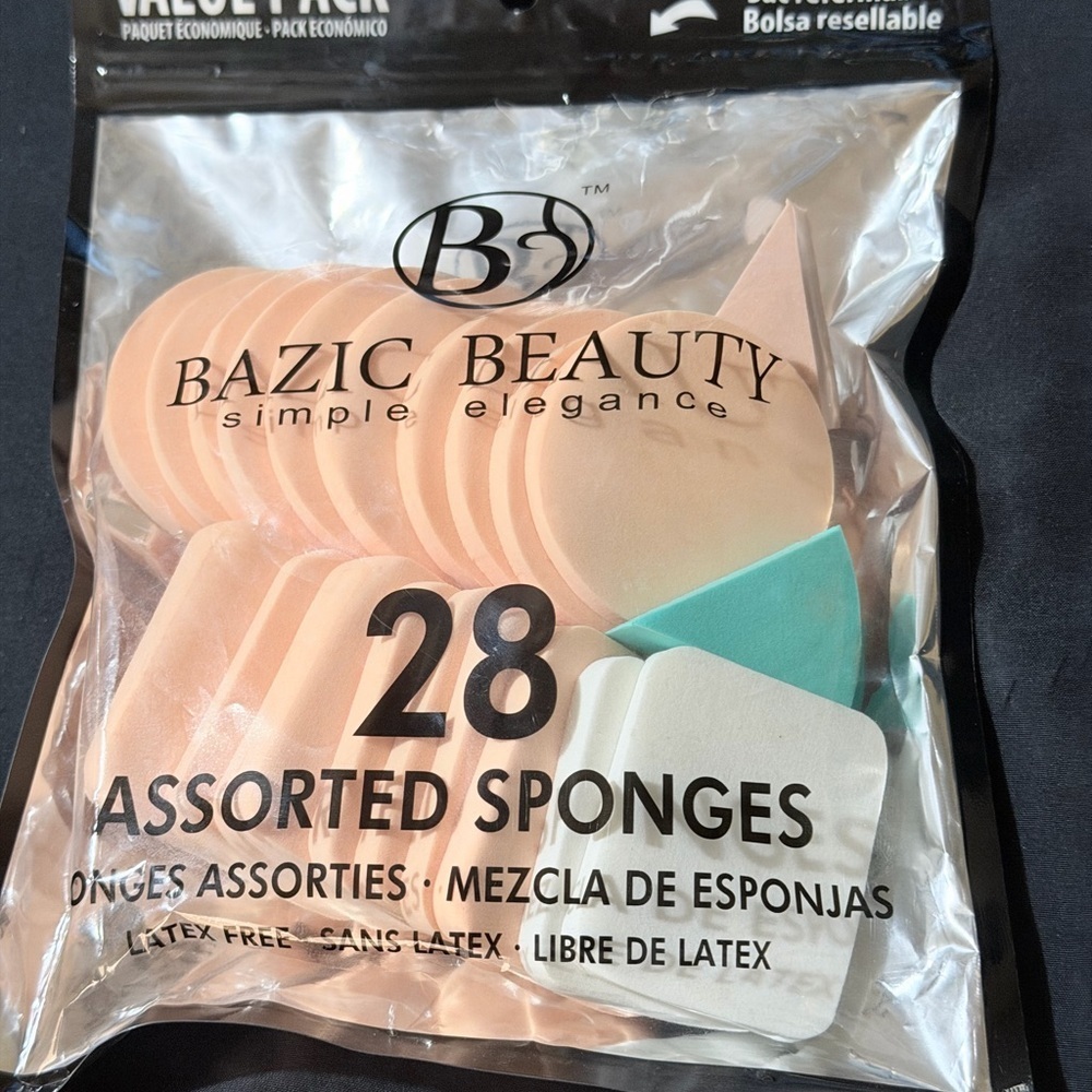 Assorted Makeup Sponges - Peach, White & Teal Only 21 on package.